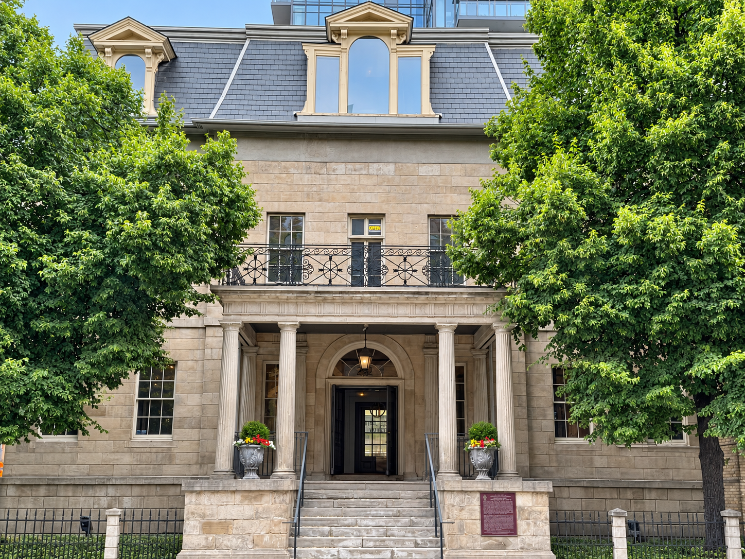 The stone portico and historic façade of the Bank of Upper Canada building